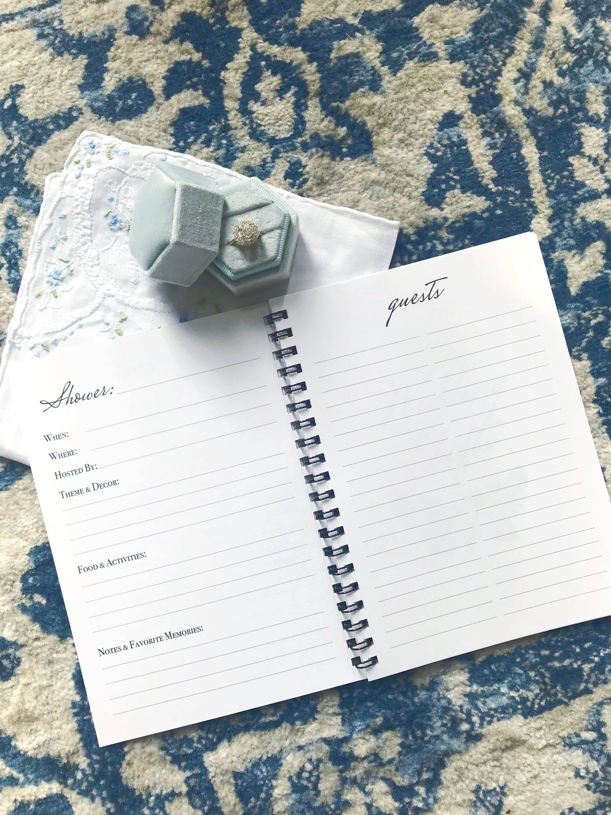 Notebook with a geometric object on a textured surface